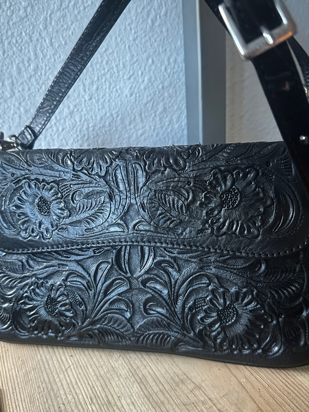 Embossed Floral Leather Crossbody Bag in Black - Picture 2 of 7